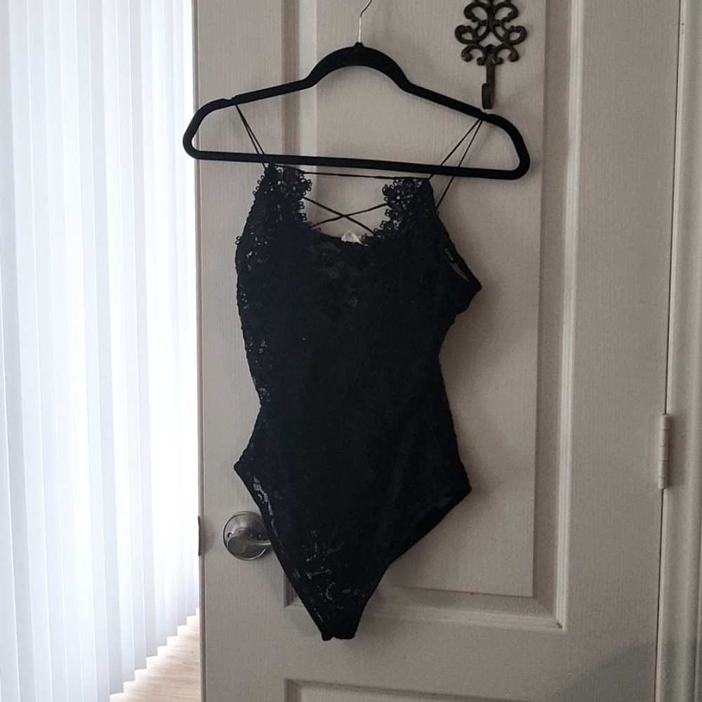 Black and crochet lace bodysuit